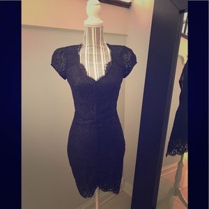 Bebe black and gold lace dress